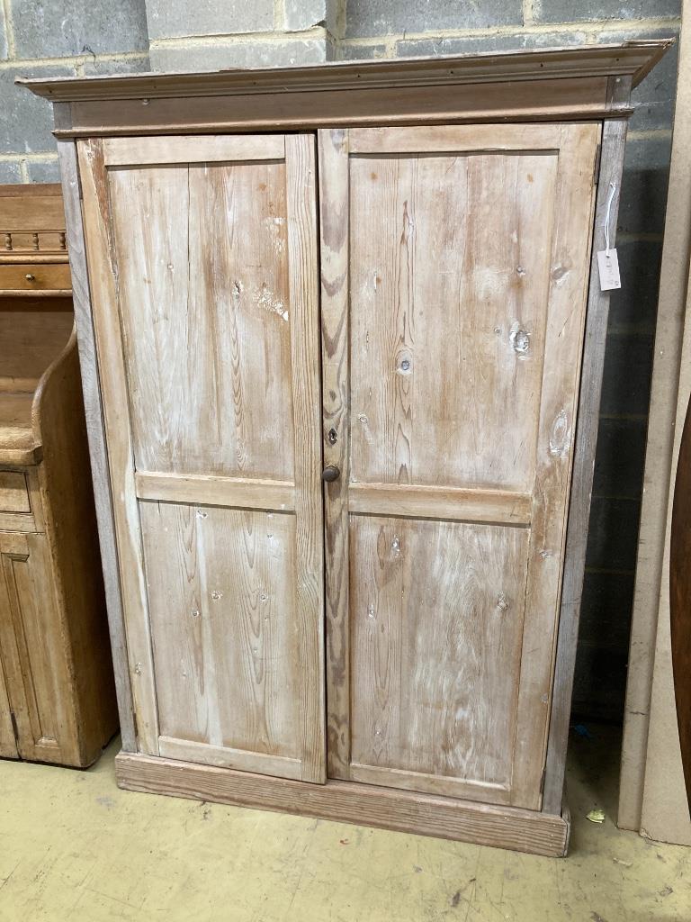 A Victorian pine two door cupboard, width 120cm, depth 45cm, height 170cm